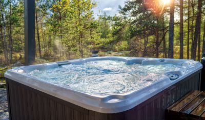 Spacious Hot Tub in Backyard